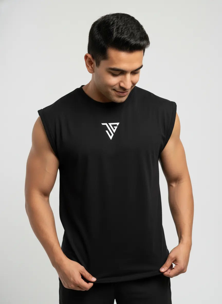 Men wearing black oversized tank top by JYGMA