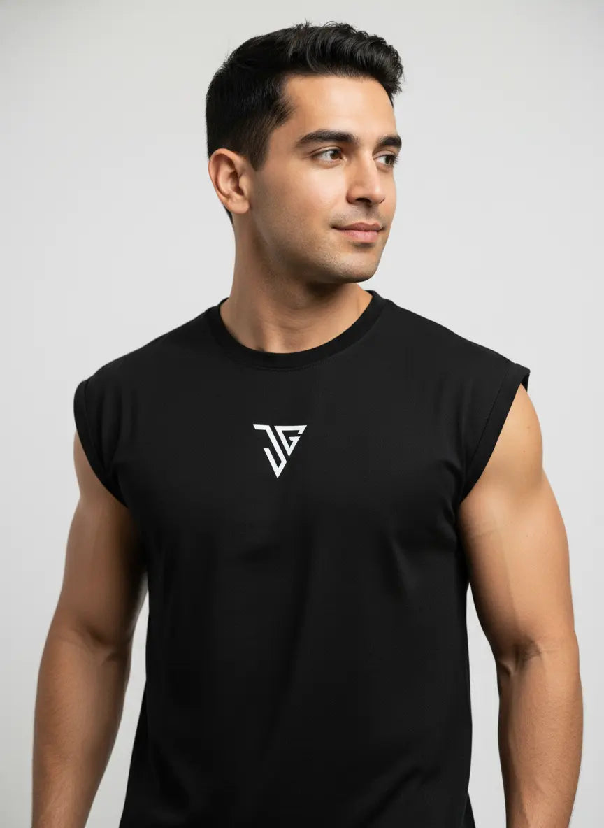 Front view of black oversized tank top worn by model