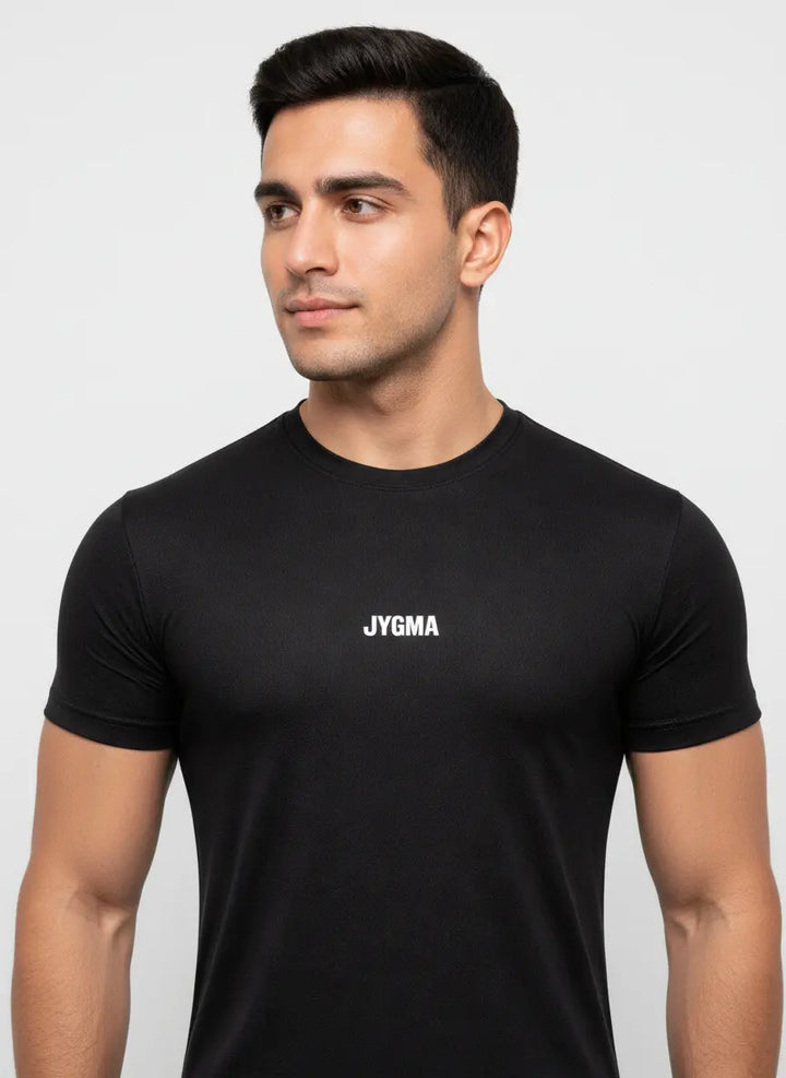 Man wearing black Performance T-Shirt by JYGMA in a front close-up pose