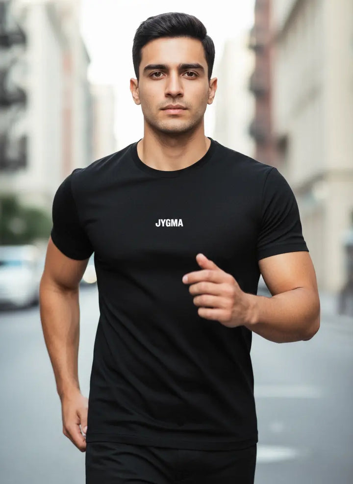 Man running wearing black Performance T-Shirt designed for active movement