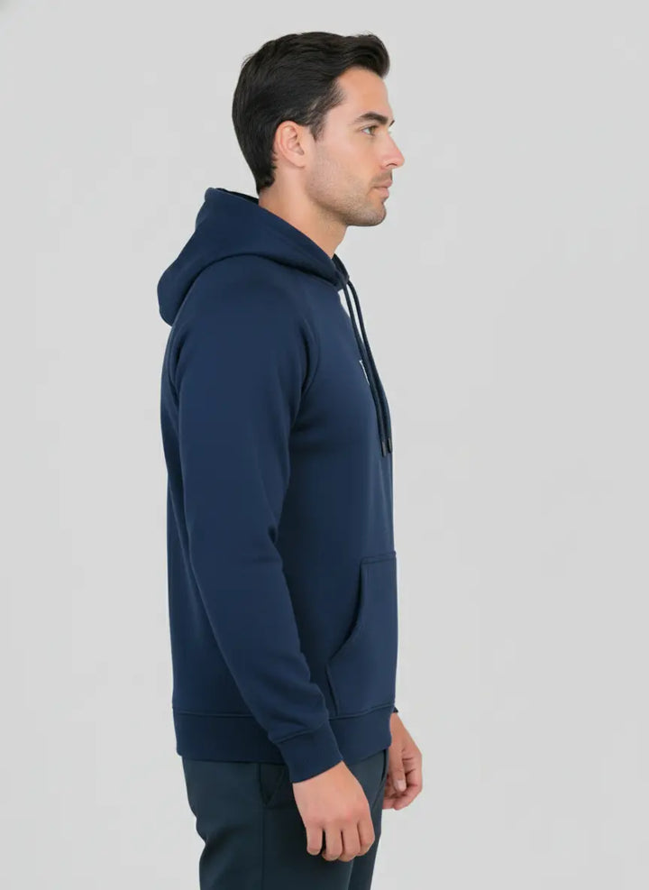 Side profile of navy blue Pride Hoodie worn by model