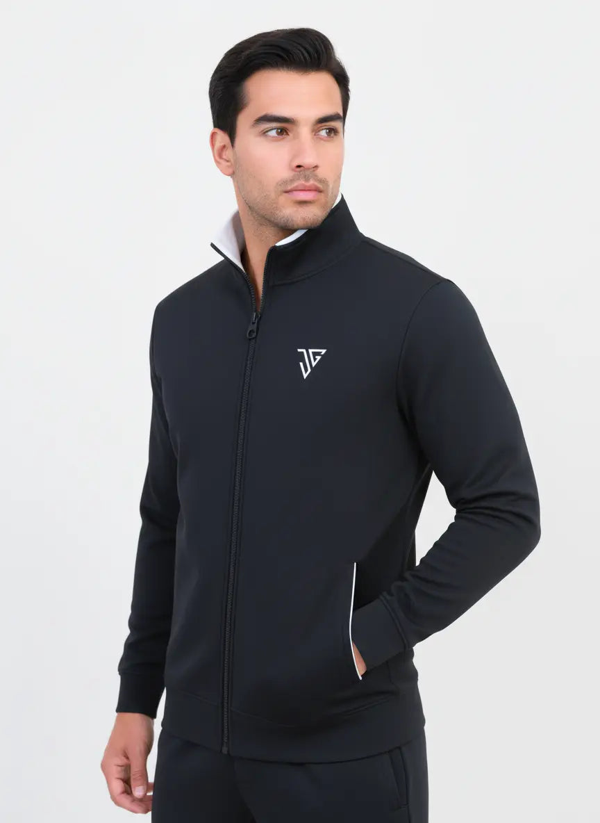 Man wearing black and white Pride Jacket by JYGMA in a front pose